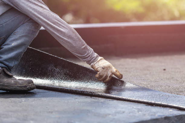 Professional Basement Waterproofing technician working in Malcolm, AL